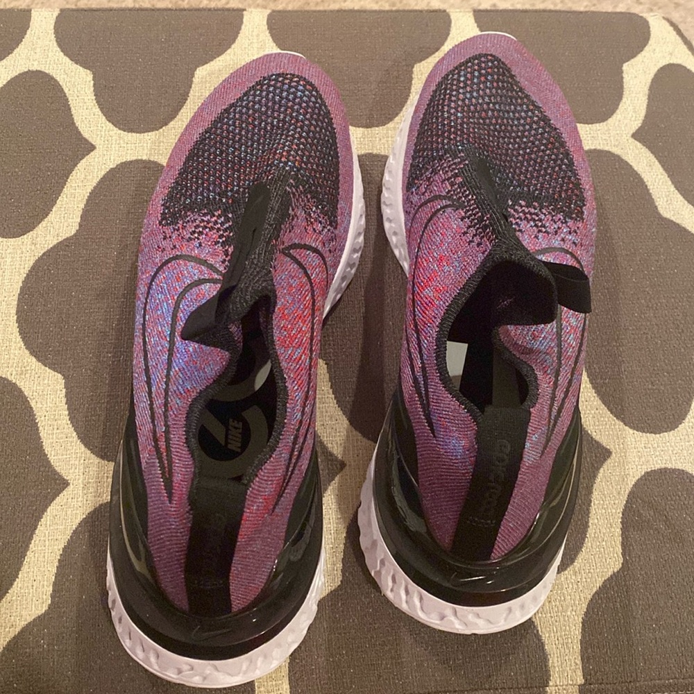 Barely worn black, pink and blue Nike slide in shoes size 11 women’s